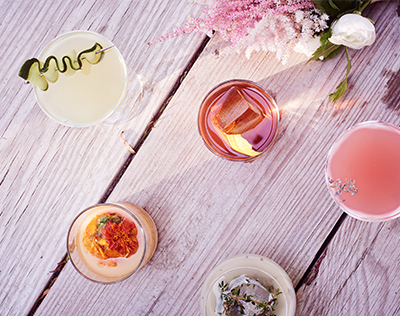 Arial View of Various Drinks on Wooden Table | David's Bridal